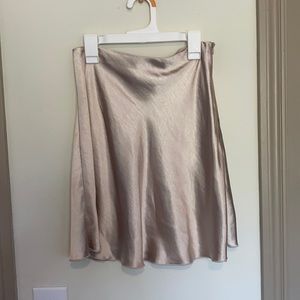 Never been worn satin skirt with zipper.